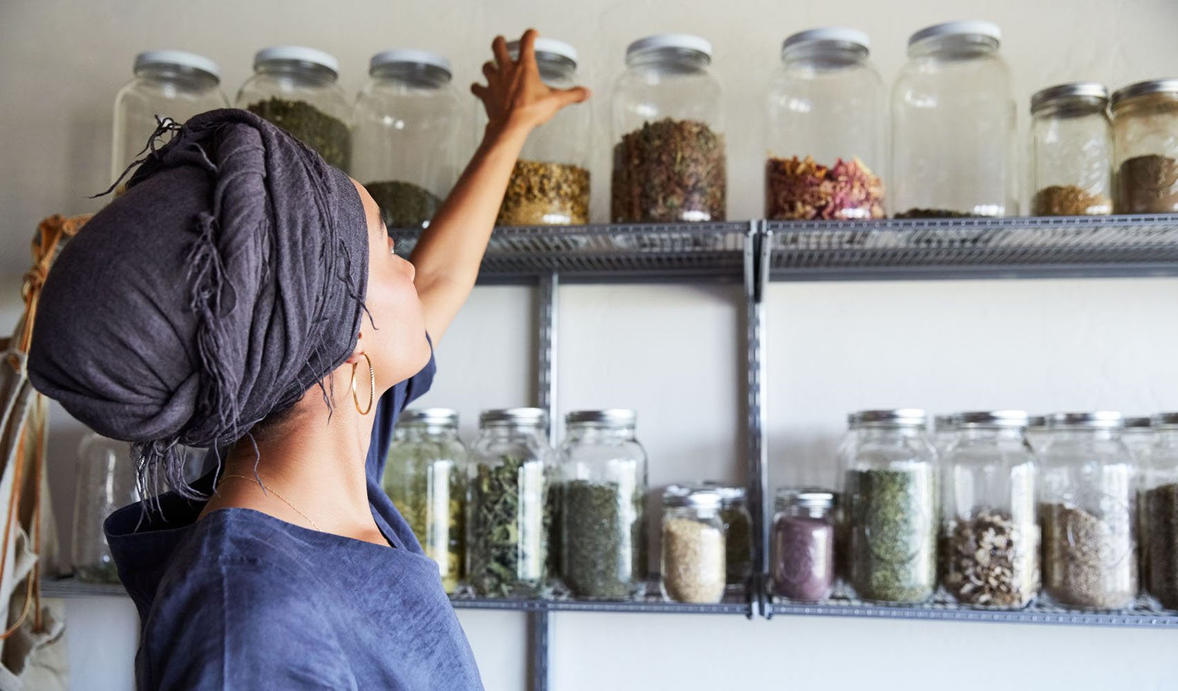 Woman making organic skincare products in her studio 