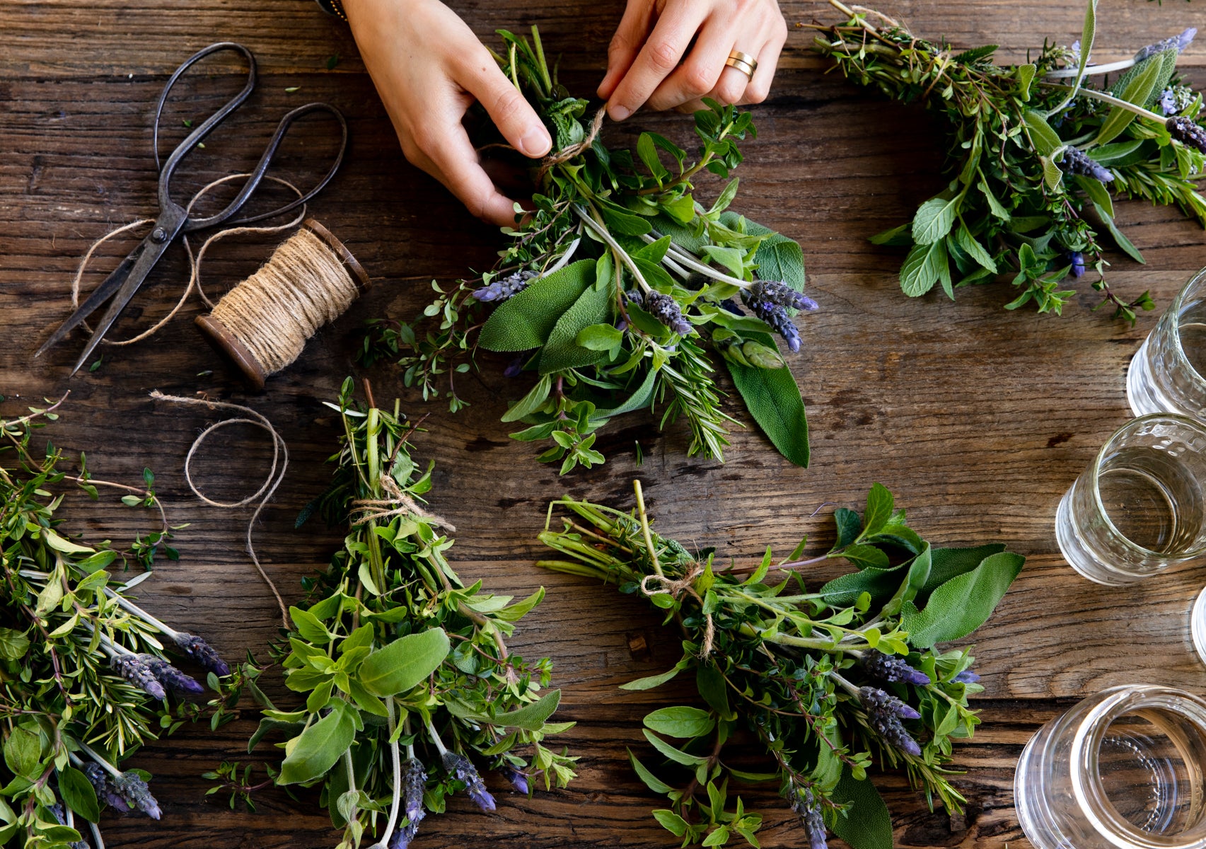 mini herbal bouquets on wood table