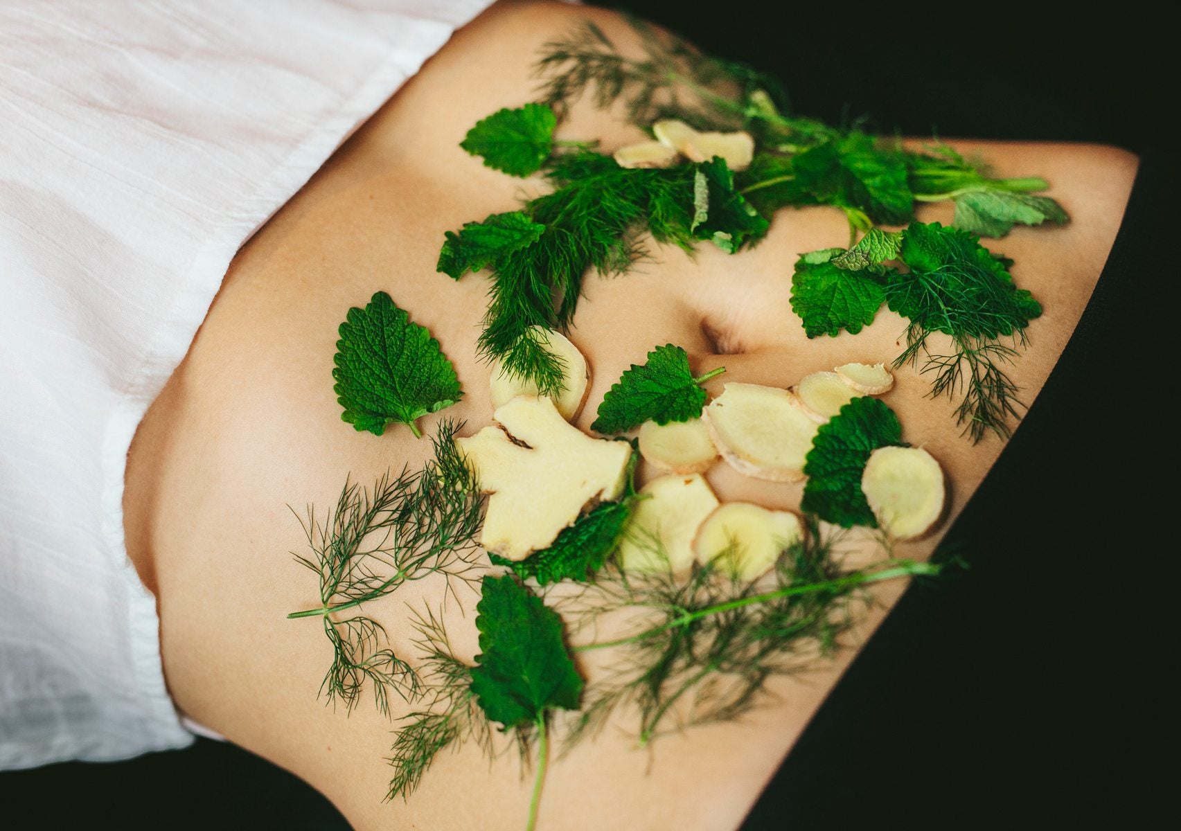 herbs placed on stomach